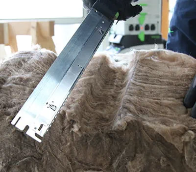 Matériau d'isolation découpé