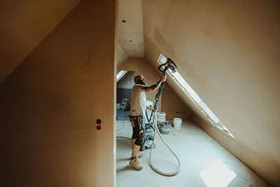La ponceuse à bras PLANEX de Festool en action sur le chantier