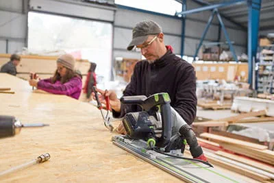 La scie circulaire portative Festool a sa place à l'atelier